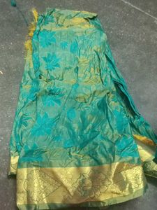 Green Floral blouse material with Gold Border