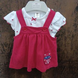 red and white dungree style frock.for newborn girls. wore only once. recently purchased