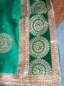 Elegant Green Saree with Golden Embroidery