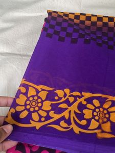 Vibrant Purple Saree with Floral Border