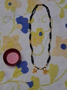 Elegant Beaded Necklace with Gold Pendant