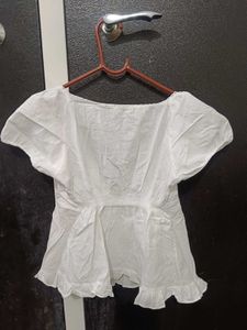 Chic White Peplum Top with Puff Sleeves