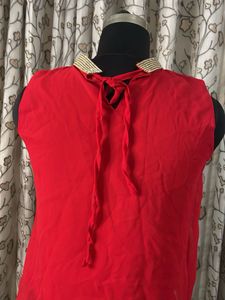 Red Embellished Neckline Sleeveless Blouse