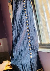 Sleeveless Black Chudidaar With Holden Buttons