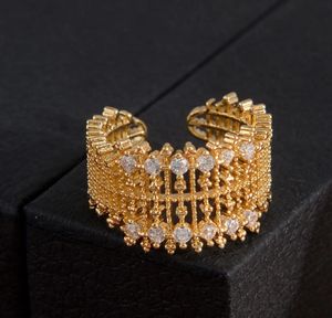Elegant Gold Tone Ring with Crystals