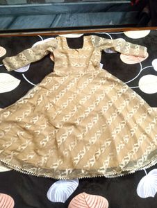 It's Beige color Gown.  I