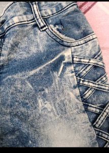 Distressed Blue Denim Jeans with Lattice Detail