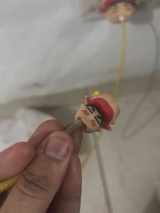 shinchan iphone charger protector