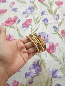 Elegant Pearl and Kundan Bangles Set