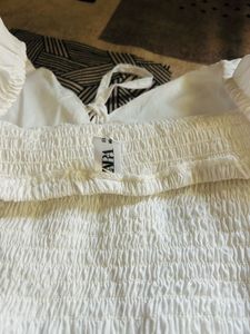 White bell sleeves top