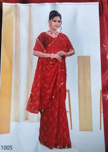 Elegant Red Saree with Golden Motifs