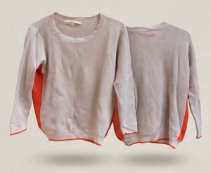 Cozy Knit Sweater with Orange Accents