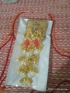 Golden Dangling Earrings with Red Stone