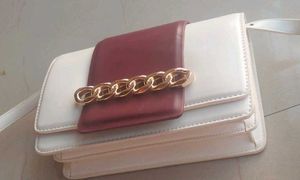 Miraggio colorblocked medium sling bag