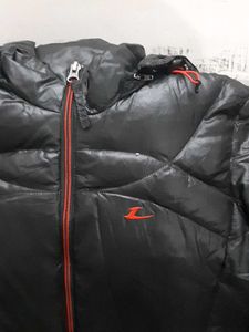 Black Puffer Jacket with Red Accents