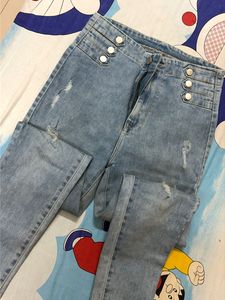 High Weist Light Wash Ripped Jeans