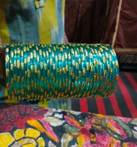 Elegant Green Glass Bangles with Gold Accents