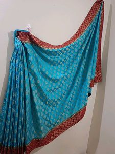 Banarasi SkyBlue Maroon And Gold With Stone Saree