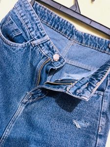 Distressed Blue Denim Jeans