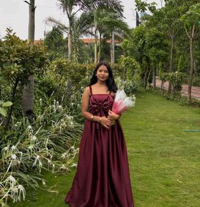 Elegant Maroon Gown with Bow Detail