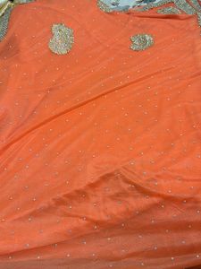 Stunning Orange Embroidered Saree