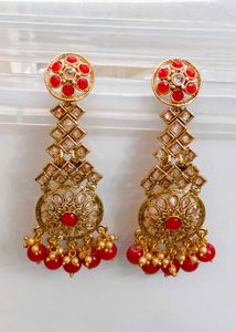 Gold Tone Dangle Earrings with Red Stones