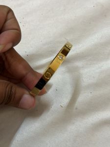 Elegant Gold Bangle with Crystals