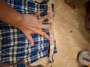 Plaid Pleated Skirt with Buckle Detail