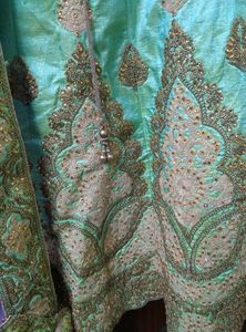 Stunning Mint Green Embroidered Lehenga Choli
