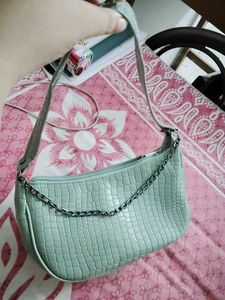 20.Stylish Croc-Embossed Shoulder Bag