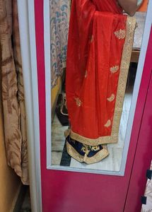 Stunning orange and Navy Blue Saree