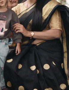 Elegant Black Saree with Gold Motifs