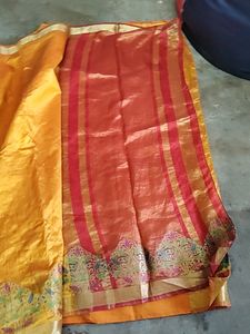 Elegant Orange Silk Saree with Floral Border