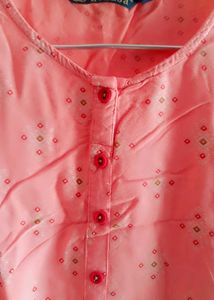 Stylish Peach Printed Kurta with Black plazo.