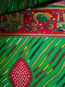 Vibrant Striped Saree with Elephant Border