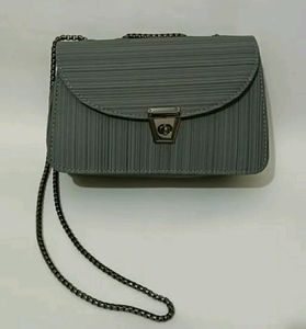 GREY SOLID BUCKLE CHAIN SLING BAG (TOTALLY NEW)