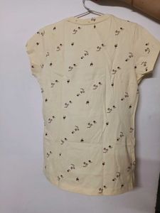 Peach coloured short sleeved tshirt