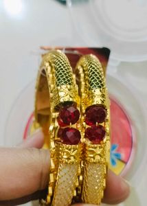 Brand new Elegant Gold Bangles with Red Stones