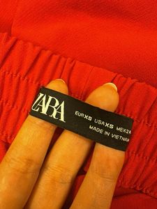 Red Slim Fit Pants with Gold Button Details