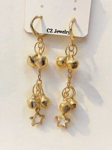 Gold Tone Dangling Bell & Star Earrings
