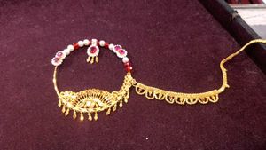 Elegant Gold Nath with Pearls & Red Stones