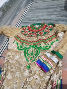 Elegant Cream Kurta with Red &amp; Green Embellishment