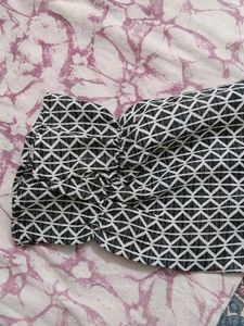 Black symmetrical designed top with full sleeves