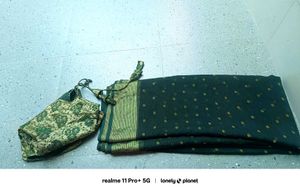 Elegant Dark Green Saree with Golden Accents
