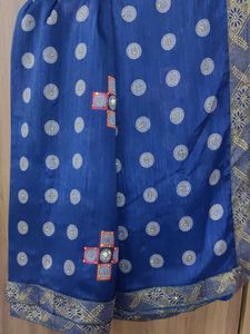Elegant Blue Sari with Geometric Embellishments