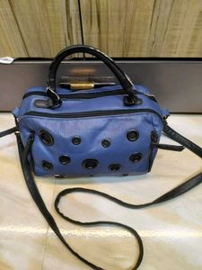Stylish Blue Handbag with Eyelet Details