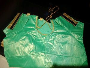 Stunning Teal Saree with Gold Border