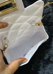 Chic White Quilted Pearl Handle Clutch