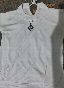 Stylish White Top with Pendant Detail