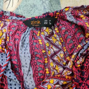 Stylish Peplum Kurta Top and blue denim